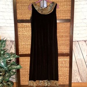 Carolyn Strauss Large floor length black sleeveless dress.